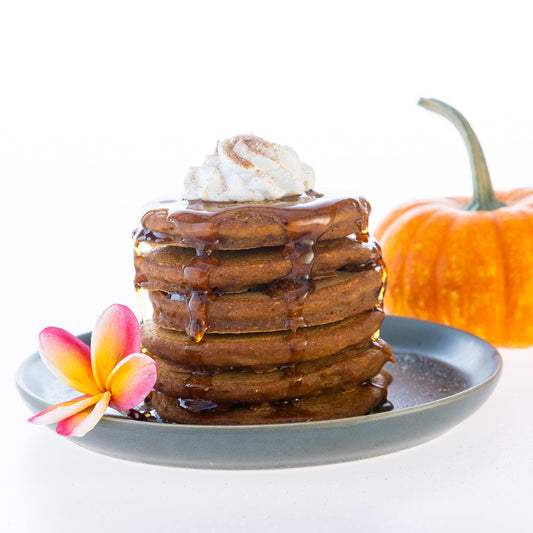 Zen Stax Pumpkin Spice pancakes with whipped topping and maple syrup